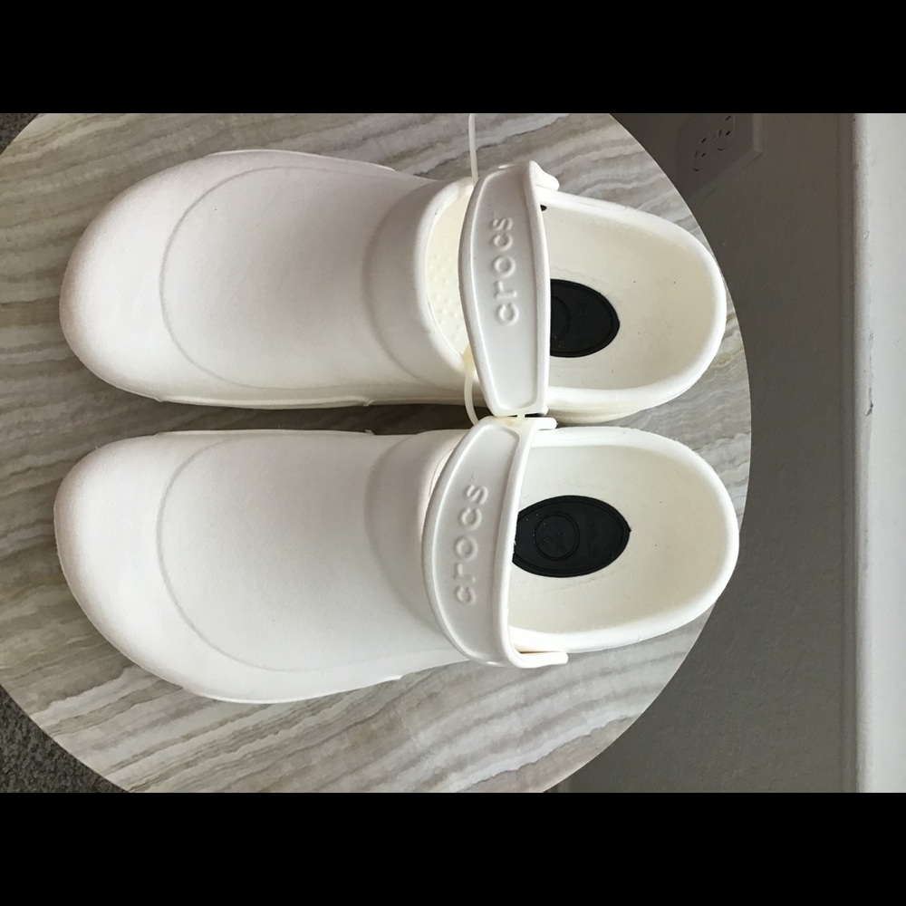 Brand new White Crocs.